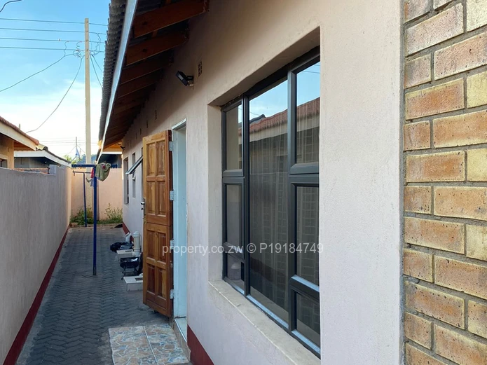 3-Bed Walled Home, Tiled Roof & Secure Gate — Aspindale