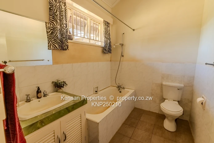 Attractive 5 bedroom home on two and a half acres. Great location and good water. (Sole Mandate)